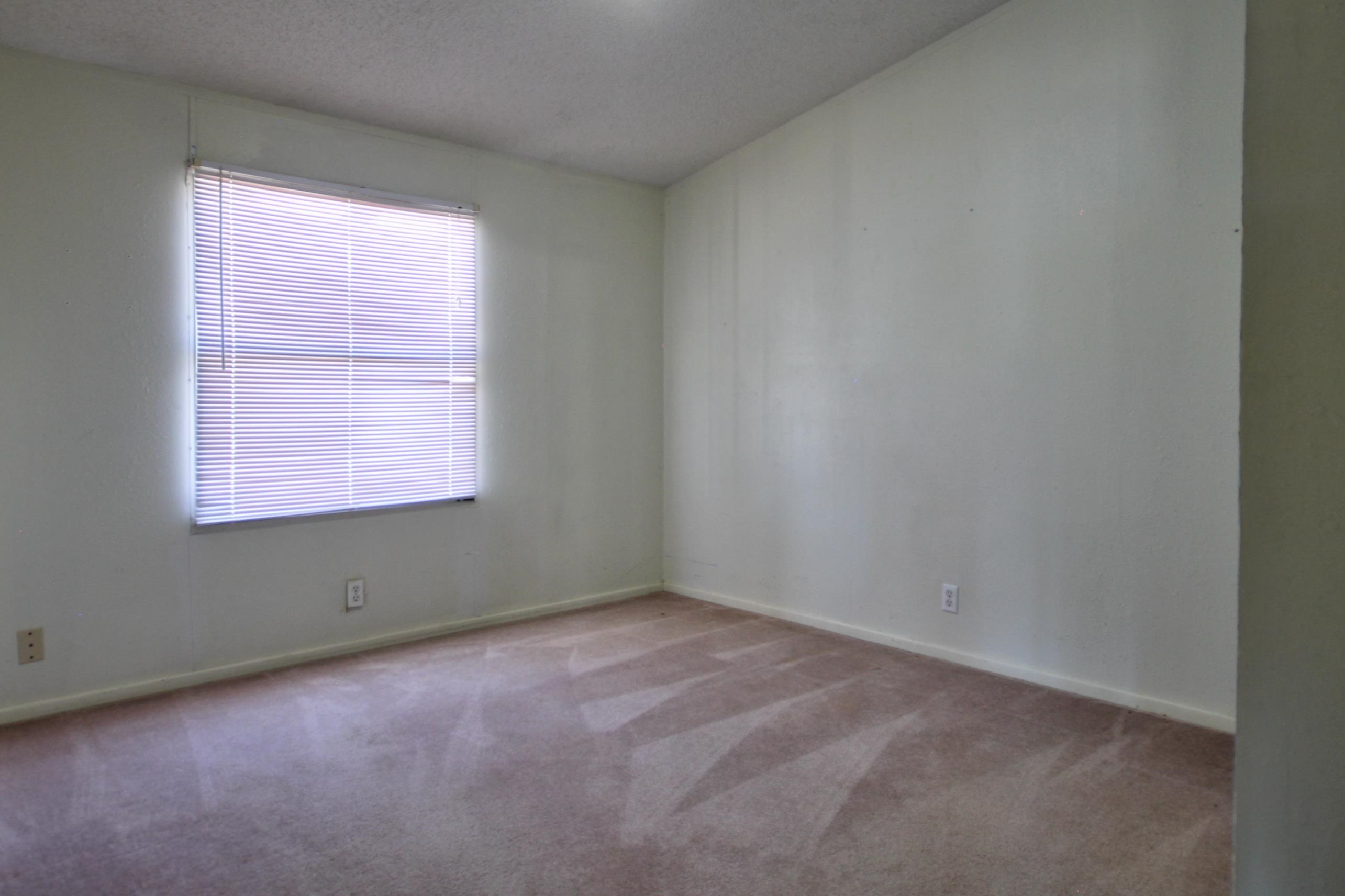 1504-2 Ranch Road 261 Buchanan Dam, TX 78609 - Photo 18 of 22 an empty room with a window