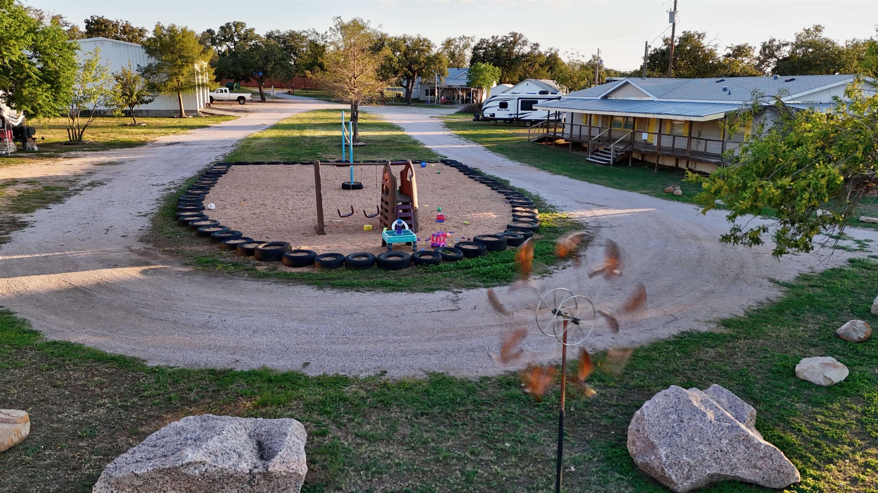 1504-2 Ranch Road 261 Buchanan Dam, TX 78609 - Photo 5 of 22 an aerial view of a house with garden space and street view