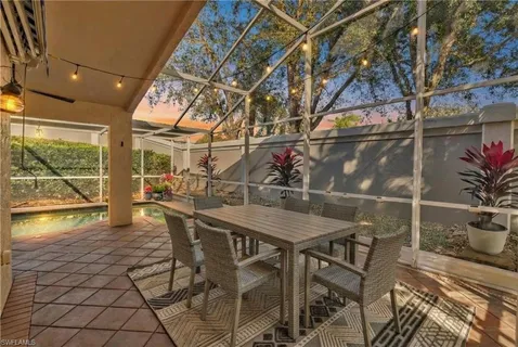a view of a room with lots of wooden furniture