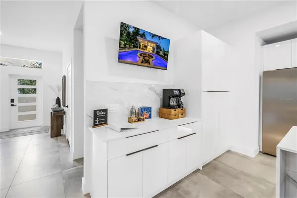 a living room with furniture and a table