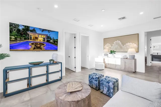 a living room with furniture and a window