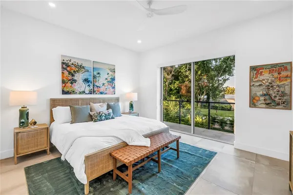 a swimming pool with yard and outdoor seating