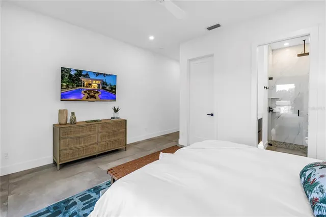 a kitchen with a stove and a refrigerator
