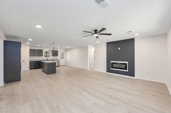 a view of a kitchen with a sink cabinets and window