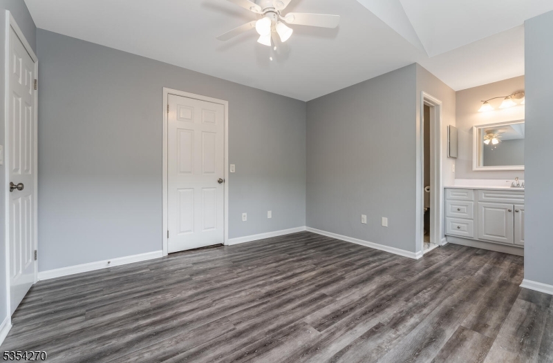 398 Terrace Lane Bedminster, NJ 07921 - Photo 19 of 31 wooden floor in an empty room with a window