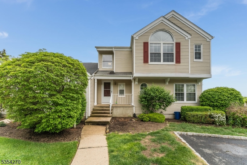398 Terrace Lane Bedminster, NJ 07921 - Photo 2 of 31 a front view of a house with a yard