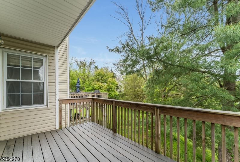 398 Terrace Lane Bedminster, NJ 07921 - Photo 30 of 31 a view of a balcony with wooden floor