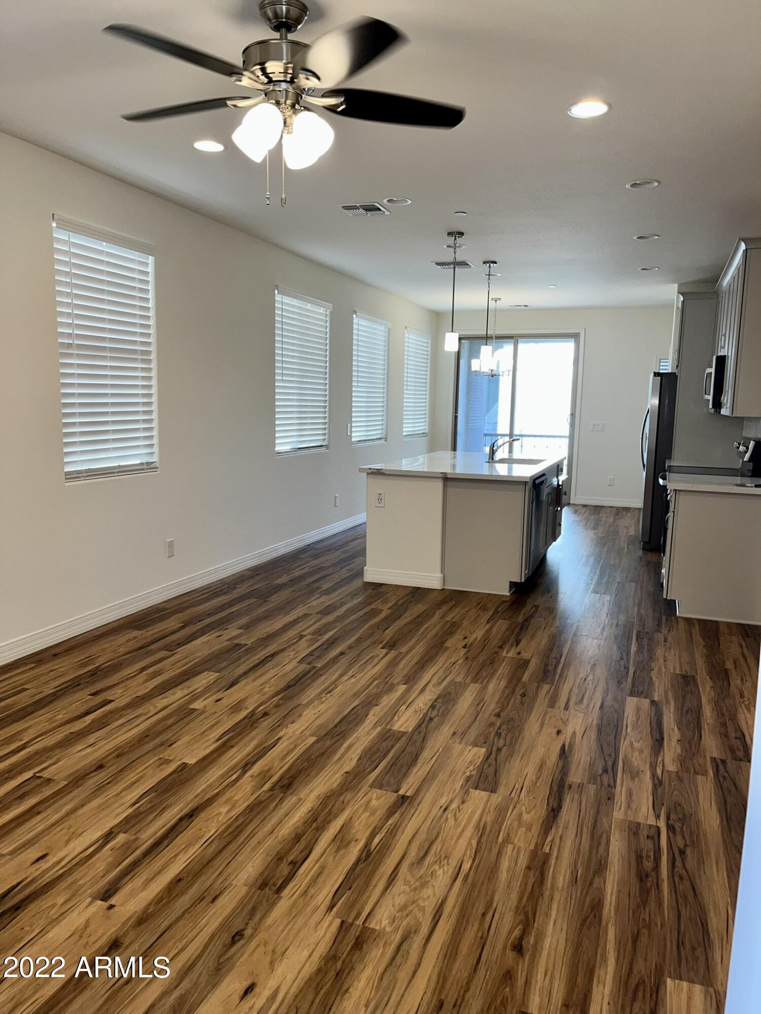 1737 East Hampton Lane Gilbert, AZ 85295 - Photo 10 of 15 a view of kitchen and kitchen with microwave