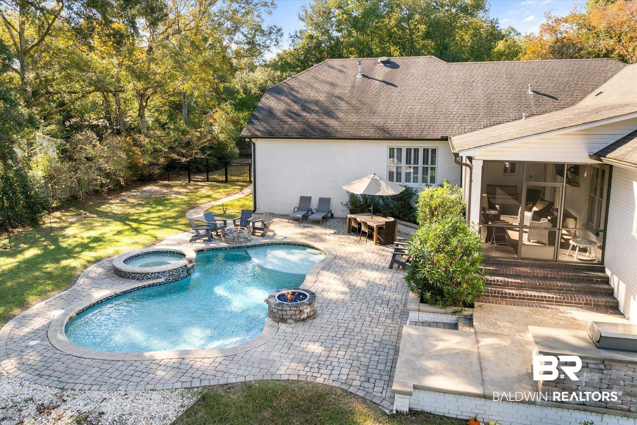 3713 Old Shell Road Mobile, AL 36608 - Photo 41 of 52 View of pool with an in ground hot tub, a fire pit, and a patio area