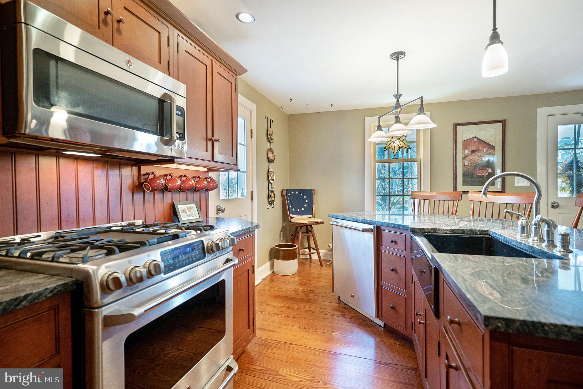 926 Stump Road Chalfont, PA 18914 - Photo 12 of 36 Cherry Cabinetry & Gas Stove