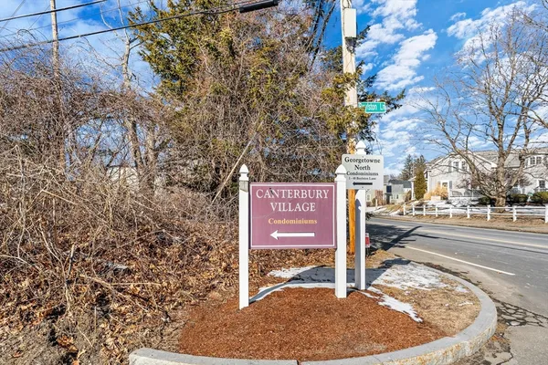 a sign board with parking space