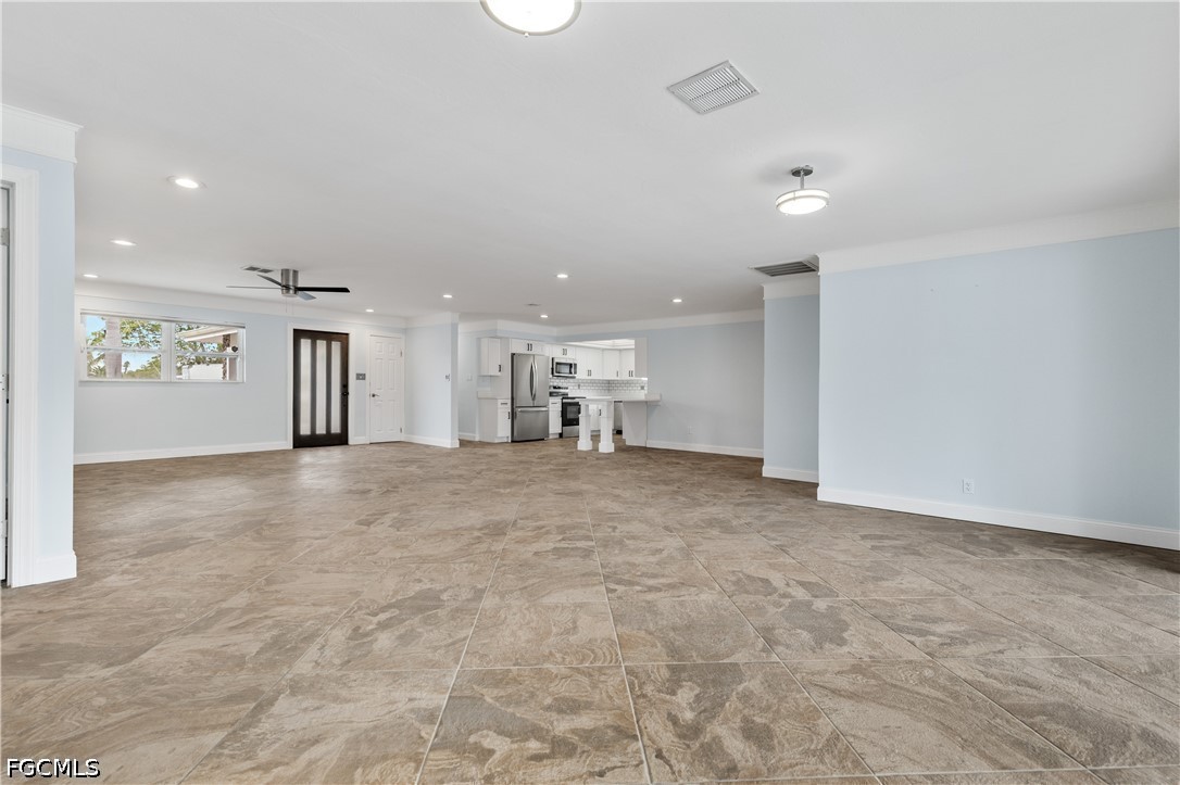 416 Seaworthy Road North Fort Myers, FL 33903 - Photo 11 of 30 a view of a livingroom with furniture and a window