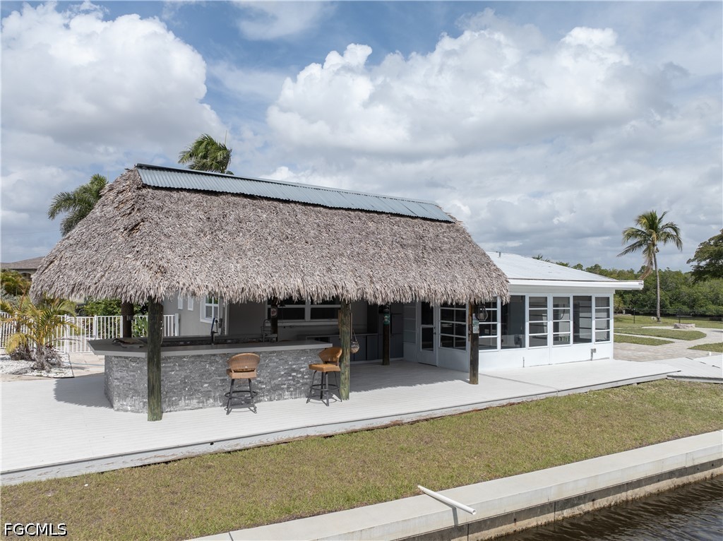 416 Seaworthy Road North Fort Myers, FL 33903 - Photo 18 of 30 a view of a building with a garden