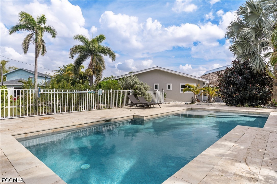 416 Seaworthy Road North Fort Myers, FL 33903 - Photo 23 of 30 a view of a house with swimming pool and sitting area