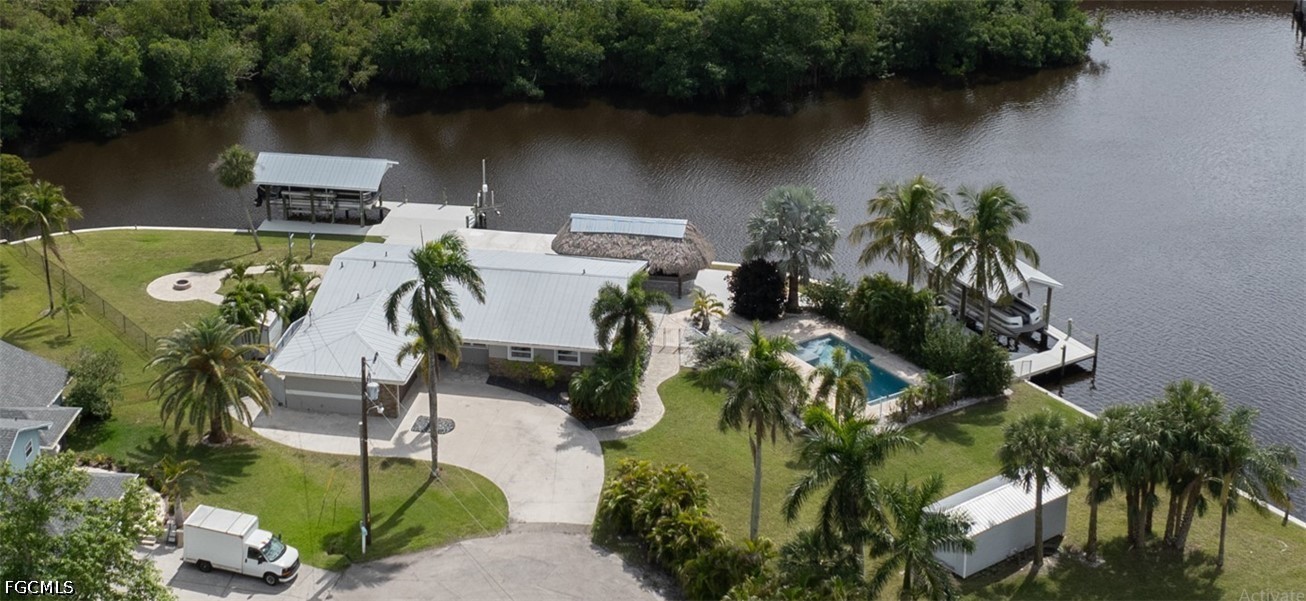 416 Seaworthy Road North Fort Myers, FL 33903 - Photo 29 of 30 an aerial view of a house with a lake view