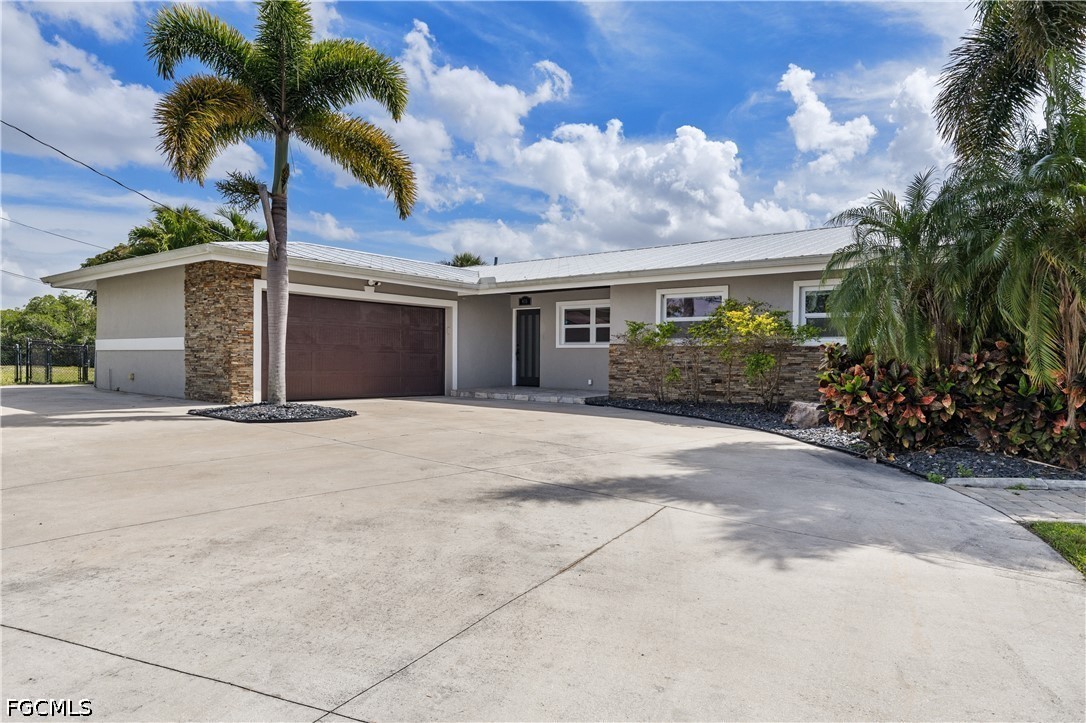 416 Seaworthy Road North Fort Myers, FL 33903 - Photo 30 of 30 front view of a house with a street