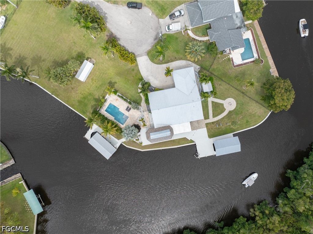 416 Seaworthy Road North Fort Myers, FL 33903 - Photo 3 of 30 an aerial view of a house with a swimming pool