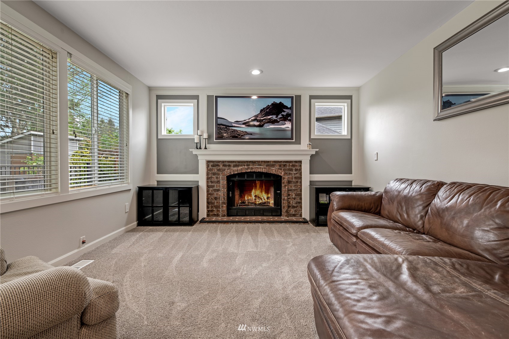20909 33rd Avenue Southeast Bothell, WA 98021 - Photo 12 of 30 a living room with furniture and a fireplace