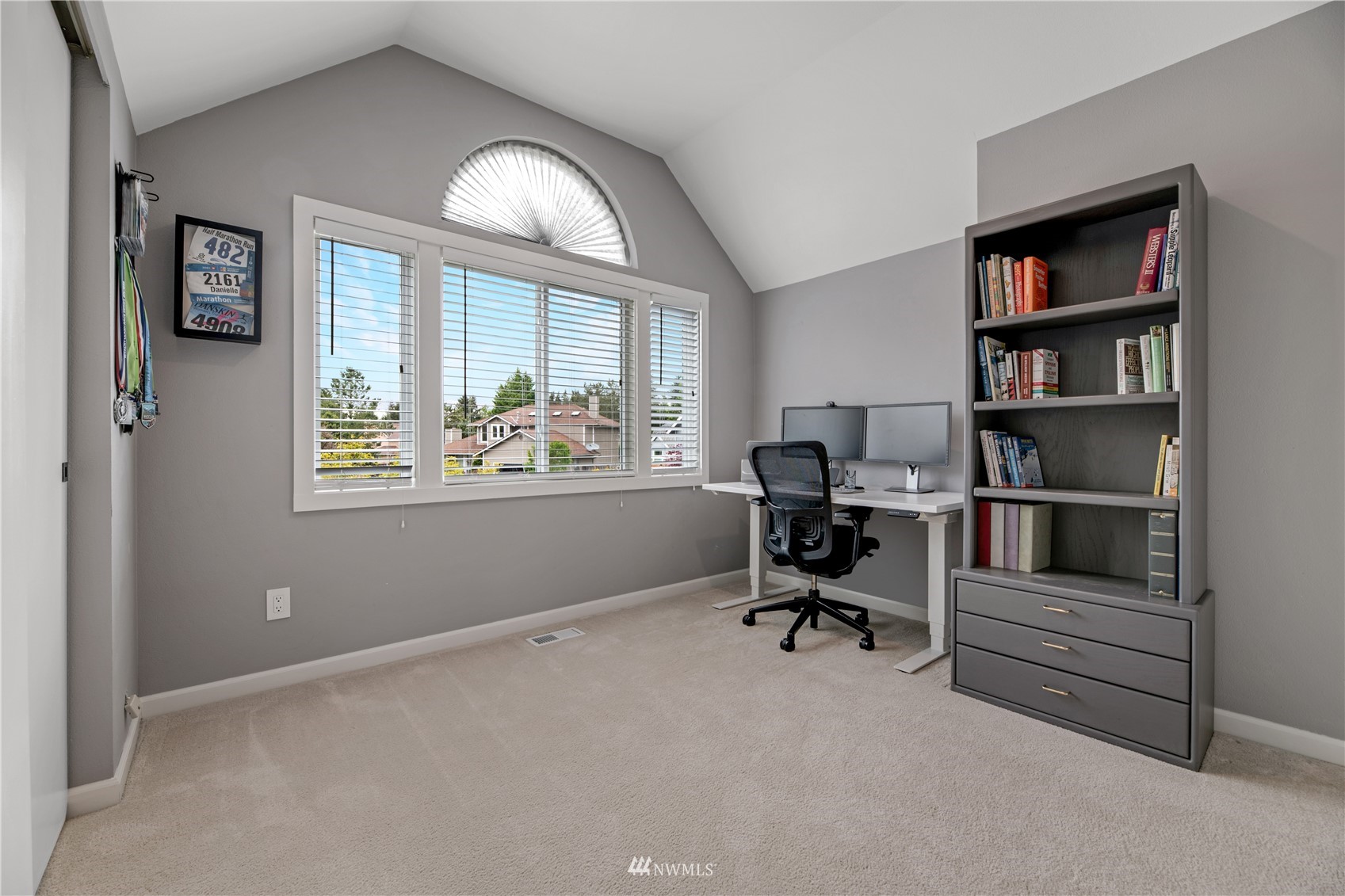 20909 33rd Avenue Southeast Bothell, WA 98021 - Photo 17 of 30 a view of a workspace with furniture and a window