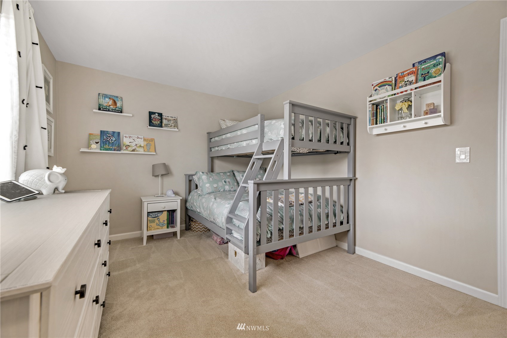 20909 33rd Avenue Southeast Bothell, WA 98021 - Photo 19 of 30 a bedroom with a bed and a desk