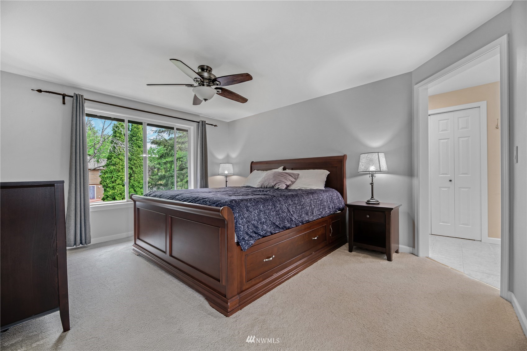 20909 33rd Avenue Southeast Bothell, WA 98021 - Photo 21 of 30 a bedroom with a bed and window
