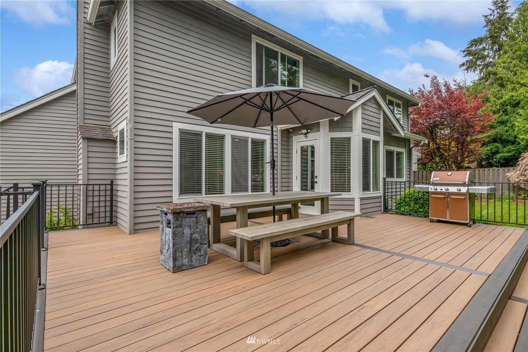 20909 33rd Avenue Southeast Bothell, WA 98021 - Photo 25 of 30 a view of a wooden chairs on the deck