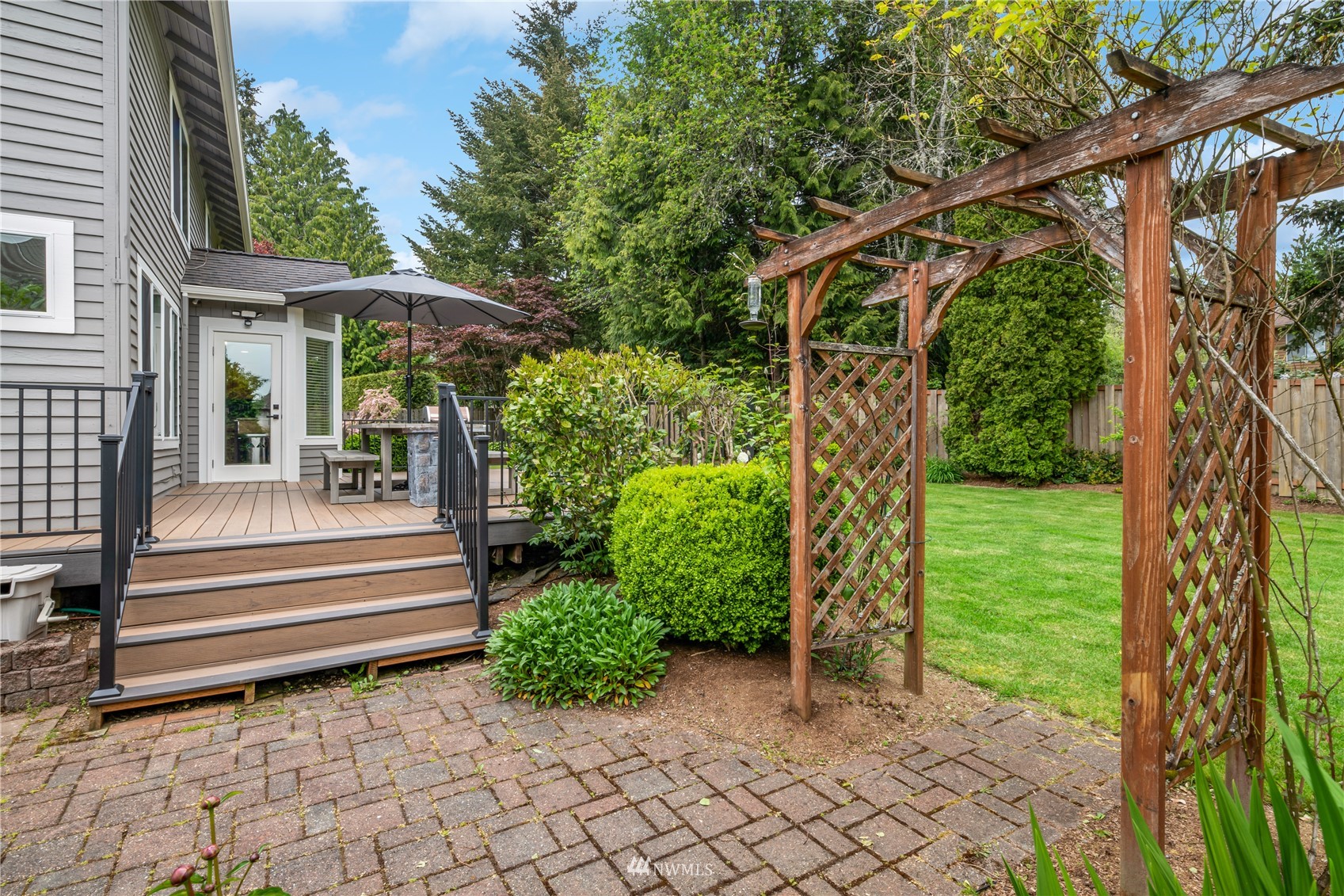20909 33rd Avenue Southeast Bothell, WA 98021 - Photo 26 of 30 a view of a chair and table in the garden