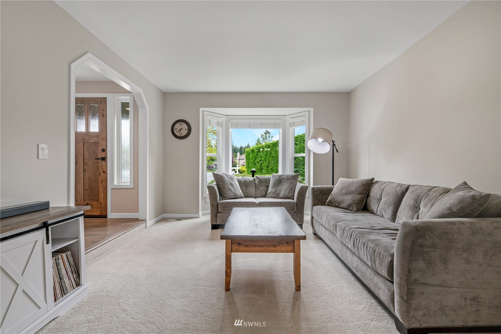 20909 33rd Avenue Southeast Bothell, WA 98021 - Photo 5 of 30 a living room with furniture and a large window