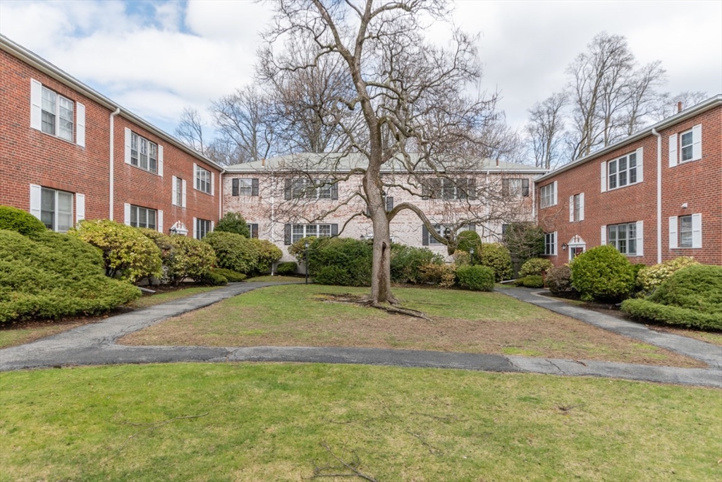 a view of a building with a garden