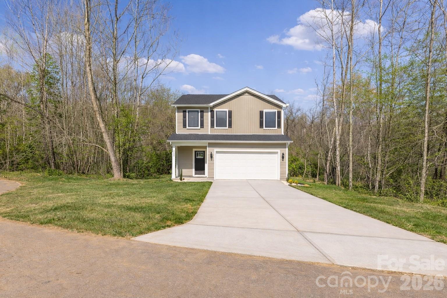 2332 Merts Way Hudson, NC 28638 - Photo 2 of 21 a front view of a house with a yard