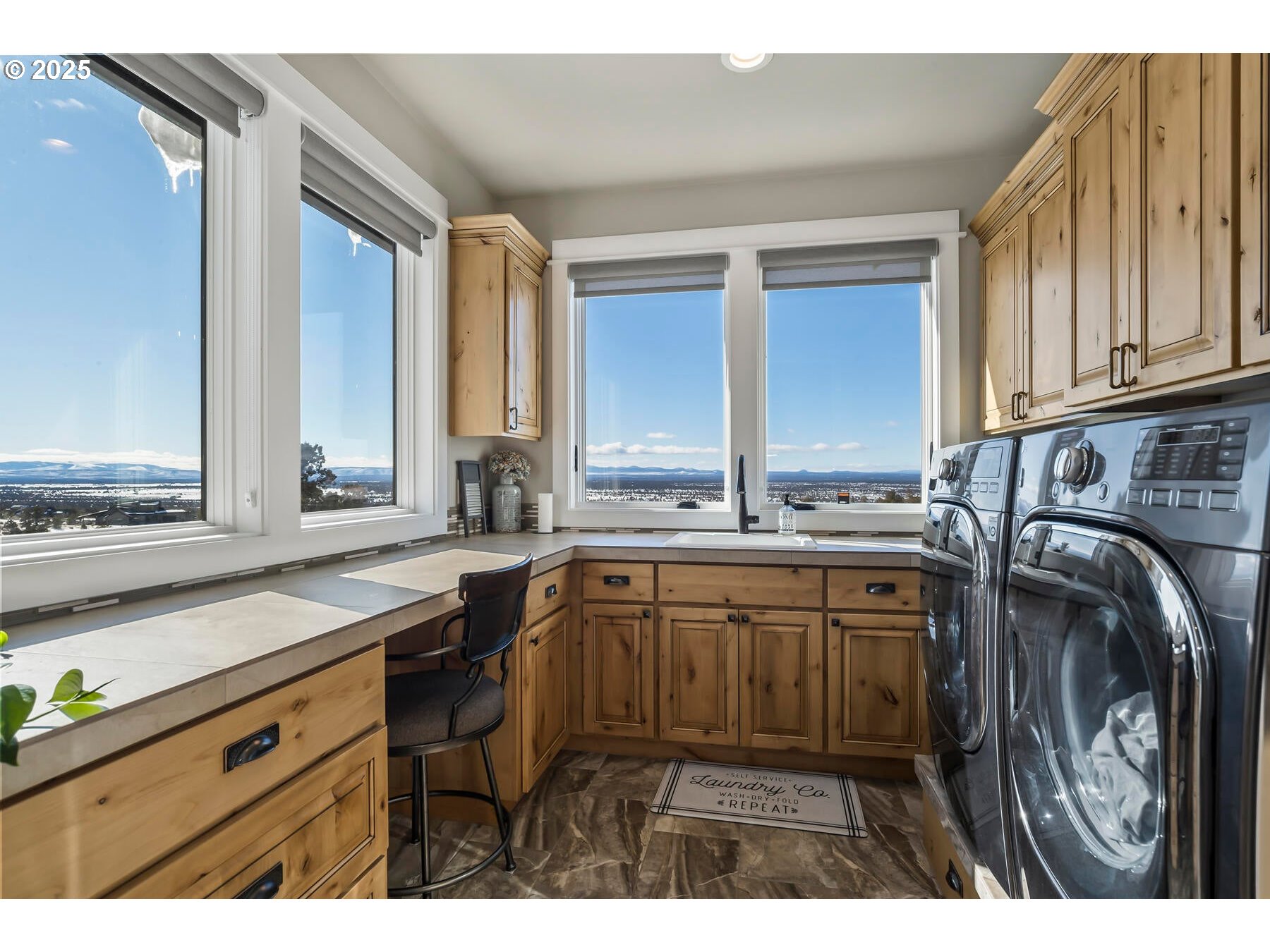 16368 South W Hat Rock Loop Powell Butte, OR 97753 - Photo 28 of 40 a kitchen with a sink cabinets and a window
