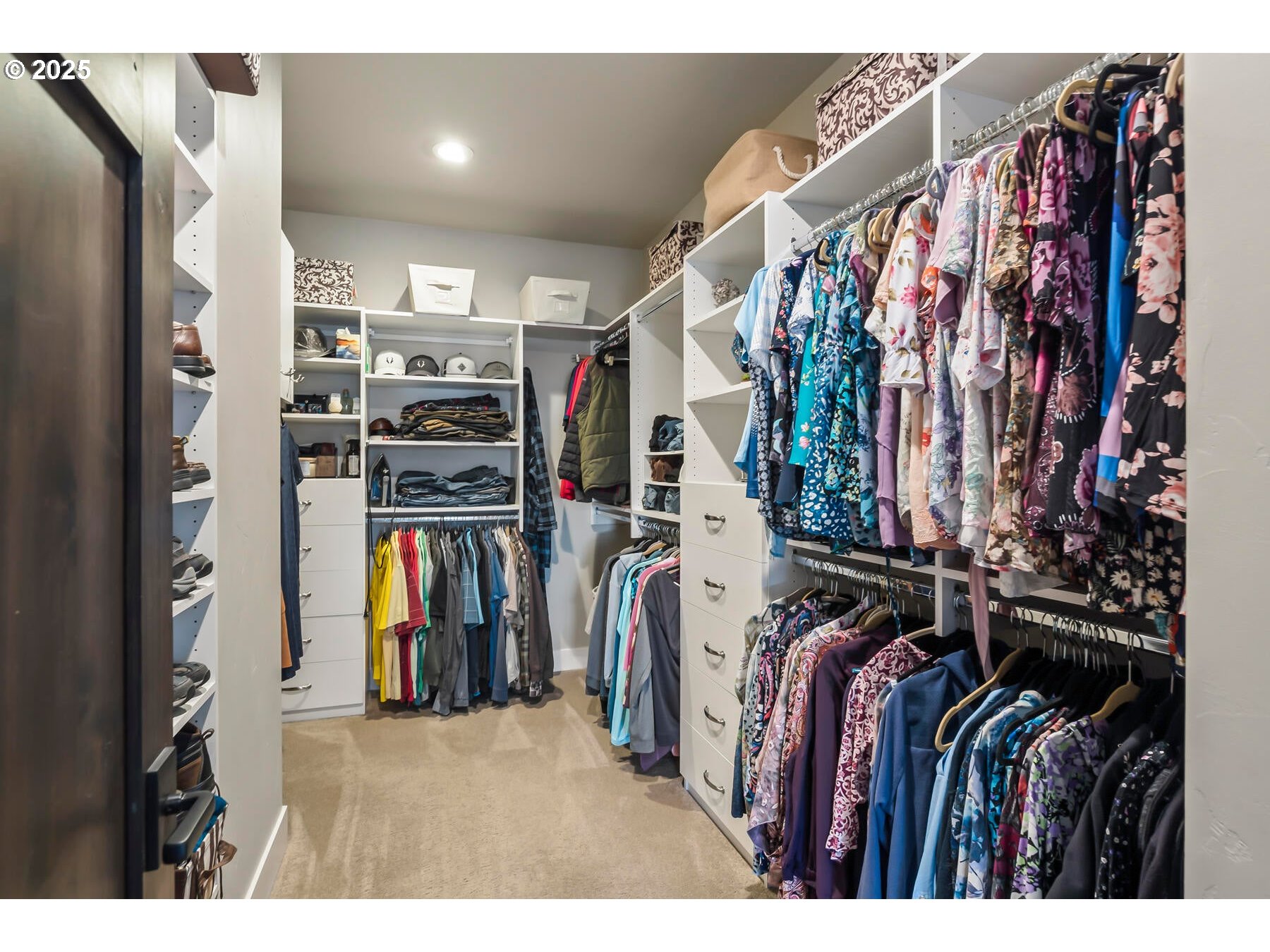 16368 South W Hat Rock Loop Powell Butte, OR 97753 - Photo 38 of 40 a view of walk in closet with clothes