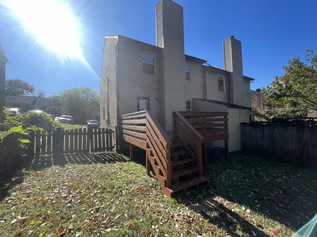 a view of a backyard with a deck