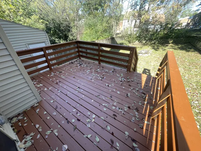 a view of outdoor space with deck and wooden floor
