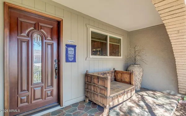a kitchen with stainless steel appliances granite countertop a sink and a stove top oven