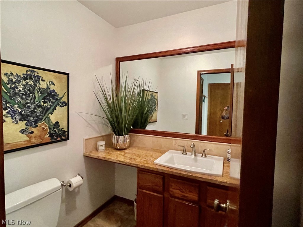 2549 Sourek Road Akron, OH 44333 - Photo 11 of 28 Let's finish off this area with the first floor private half bath.