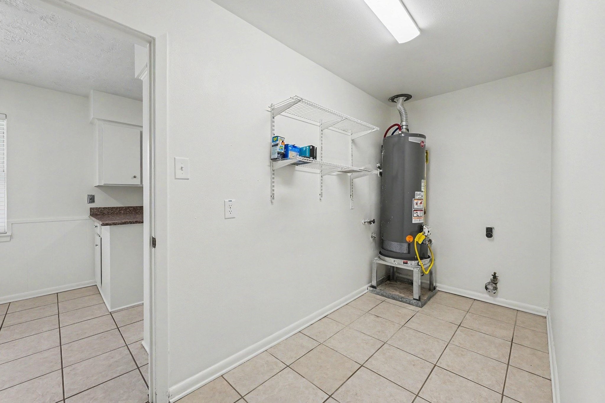 9315 Val Verde Street Houston, TX 77063 - Photo 23 of 27 Utility room in house!
