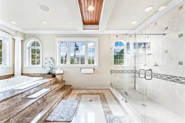 a very nice looking living room with wooden floor and furniture