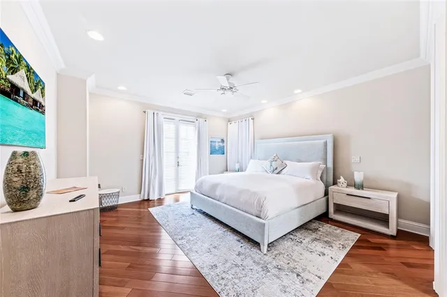 a bathroom with a granite countertop sink toilet a mirror and shower