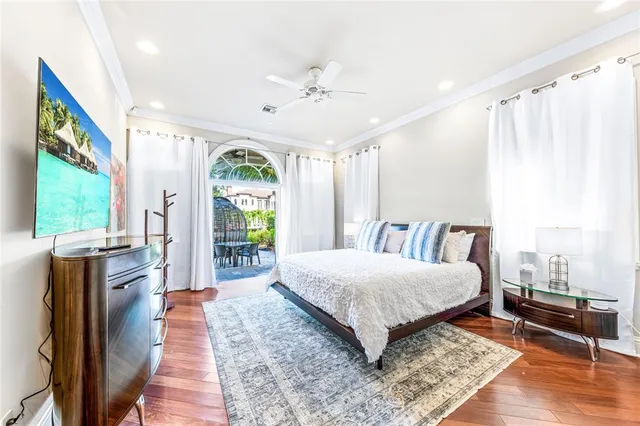a bathroom with a double vanity sink toilet mirror and shower