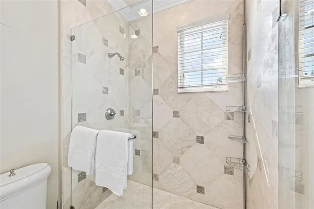 a view of living room with furniture and a fireplace