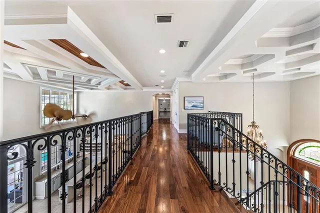 a view of a house with backyard patio and swimming pool