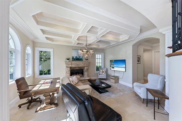 a work room with furniture and a fireplace