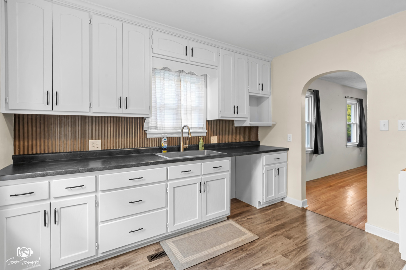 915 West Gardner Road Mazon, IL 60444 - Photo 8 of 20 a kitchen with granite countertop white cabinets and sink