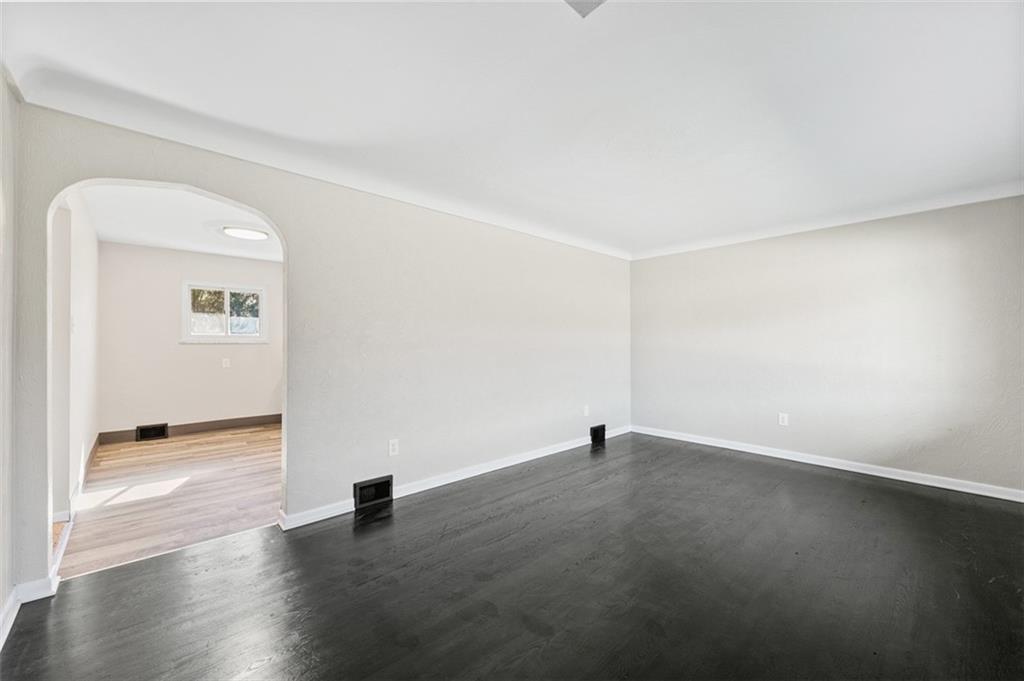 3767 Wiestertown Road Export, PA 15632 - Photo 11 of 34 an empty room with wooden floor and windows