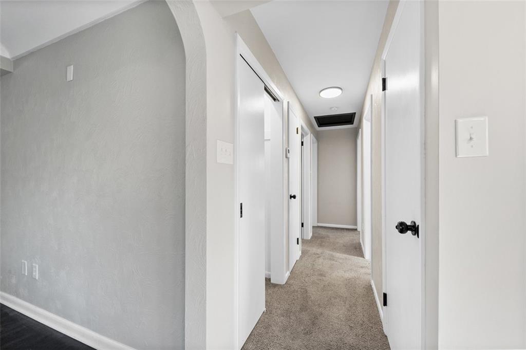 3767 Wiestertown Road Export, PA 15632 - Photo 18 of 34 a view of a hallway with wooden floor and glass door
