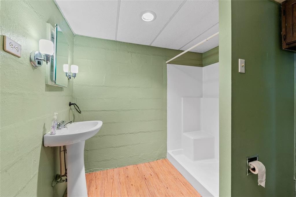 3767 Wiestertown Road Export, PA 15632 - Photo 31 of 34 a bathroom with a sink and a mirror