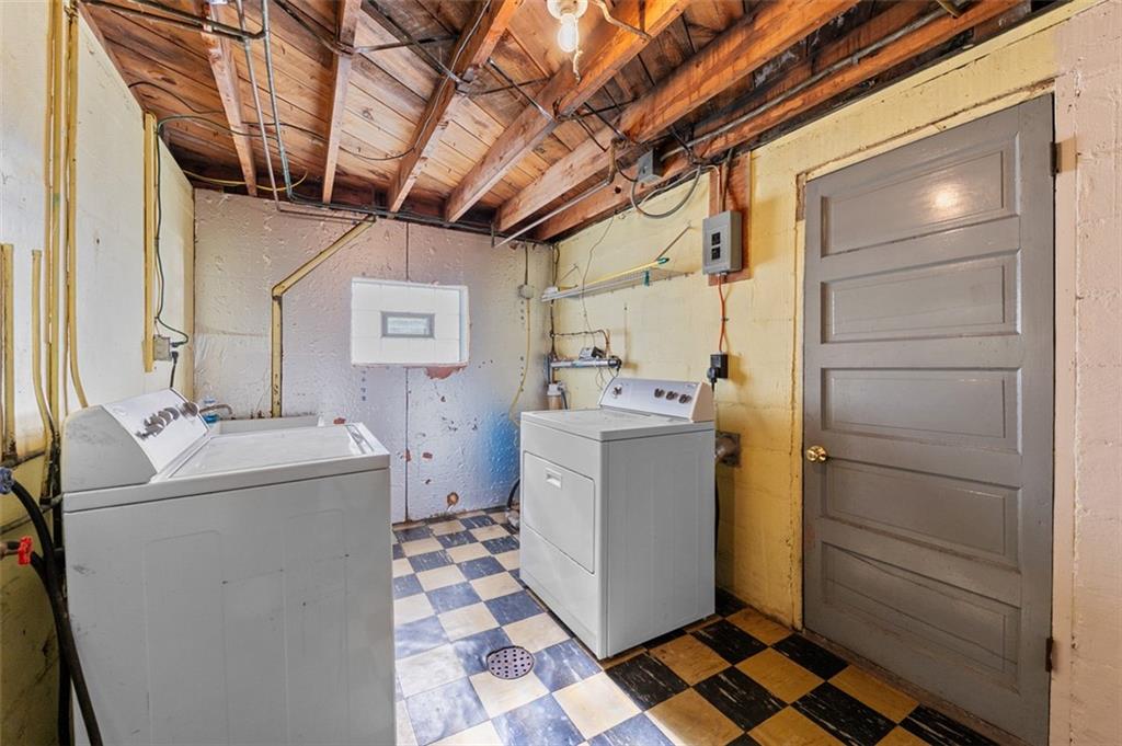 3767 Wiestertown Road Export, PA 15632 - Photo 32 of 34 a utility room with dryer and washer