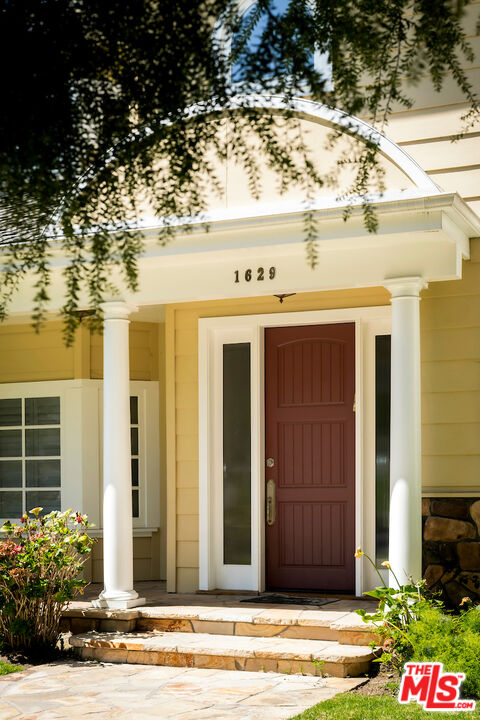 1629 Reeves Street Los Angeles, CA 90035 - Photo 6 of 7 a view of a entryway door front of house