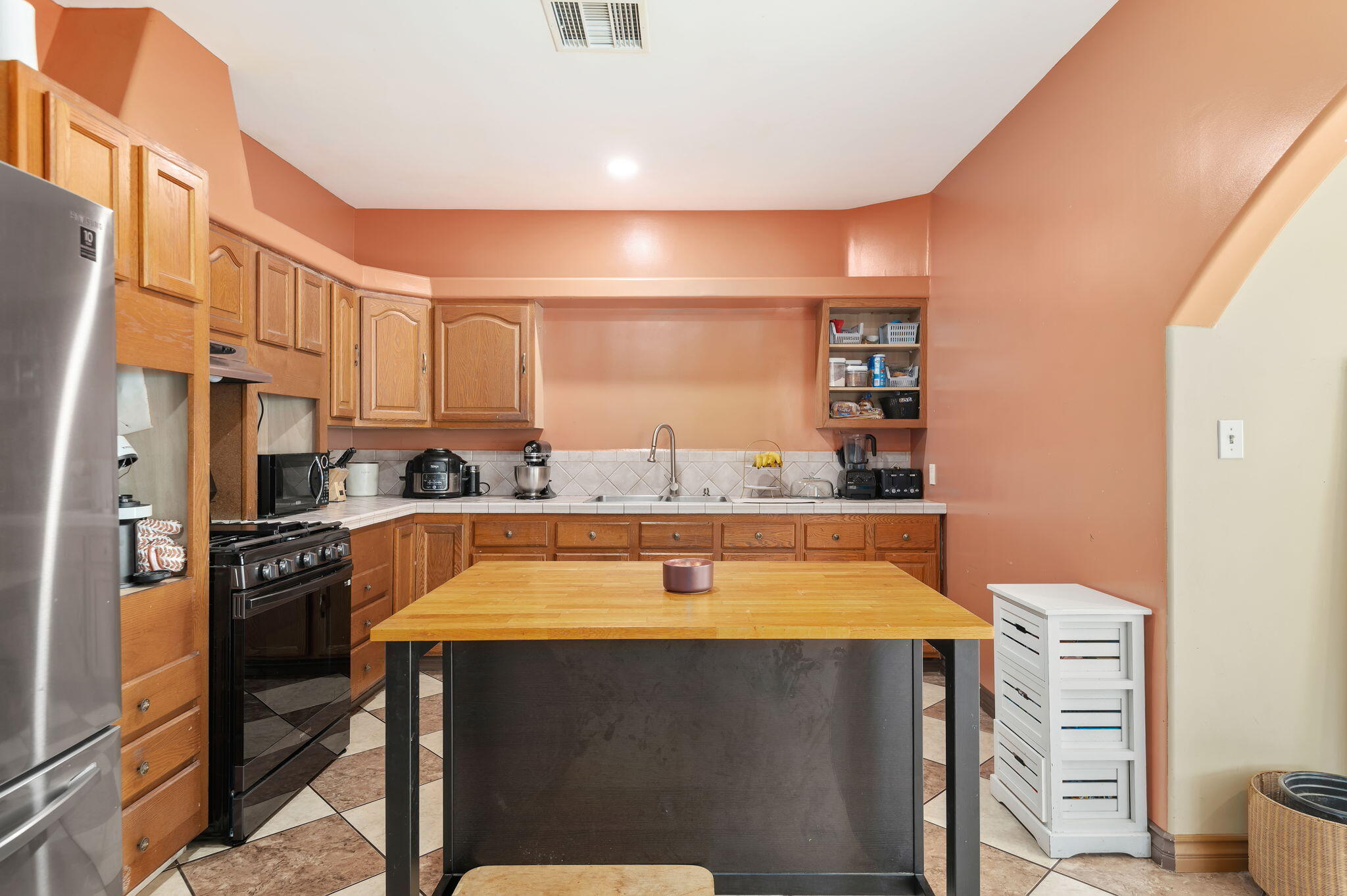 717 West Villanova Road Ojai, CA 93023 - Photo 17 of 34 a room with stainless steel appliances a refrigerator and cabinets